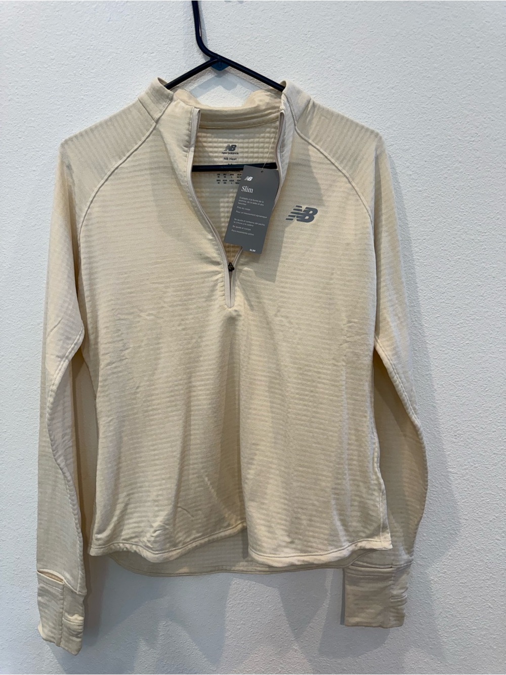 New Balance womens Cream Quarter-Zip Performance Sweater